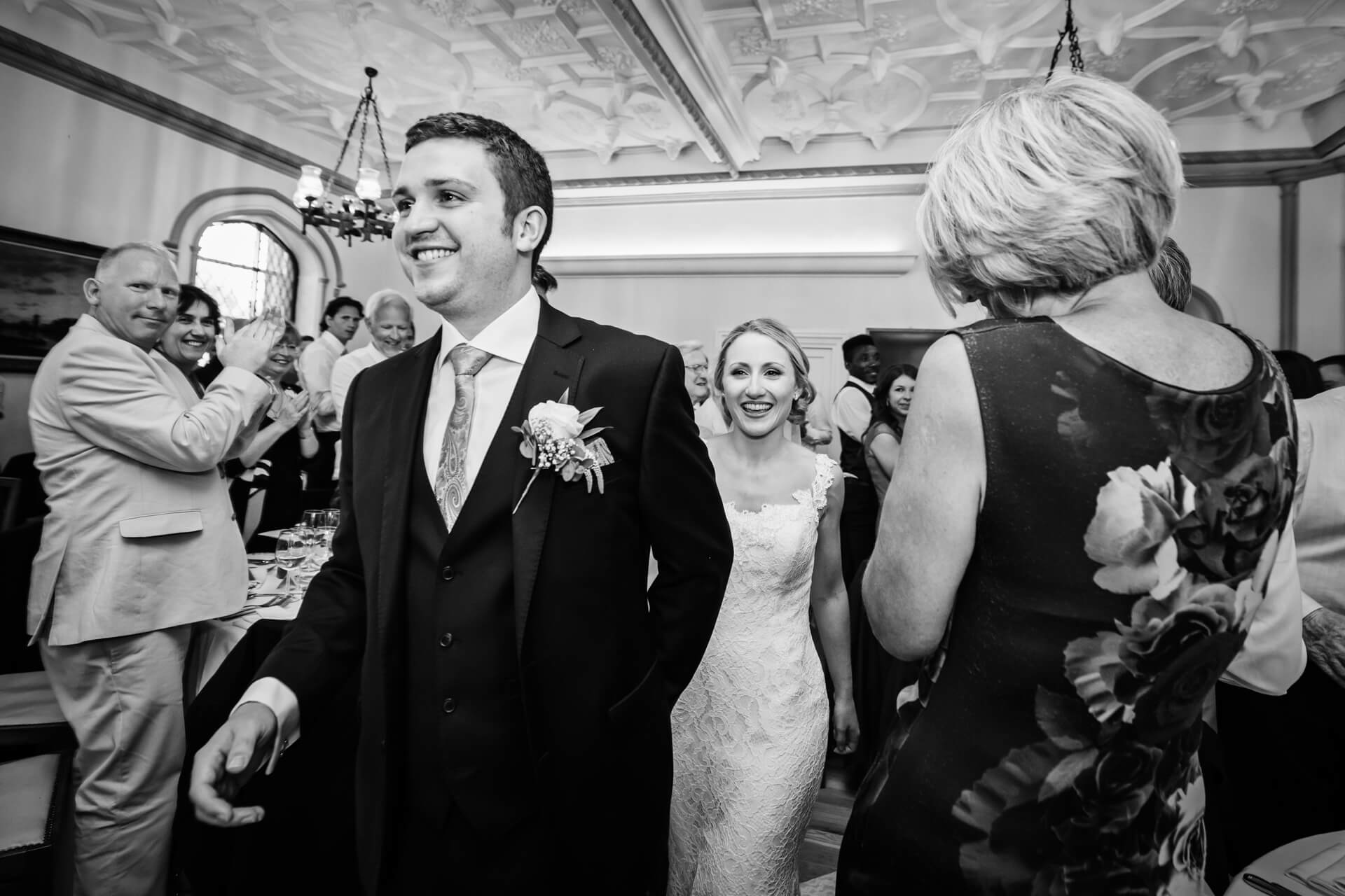Denton Hall Wedding Photograpy - couple enter the reception room