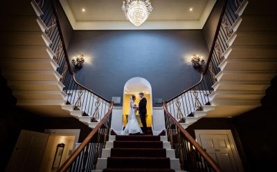 Rudding Park Wedding Photographer - Couple portrait on the stairs