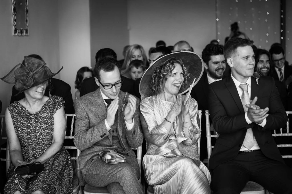 guests clapping during the ceremony
