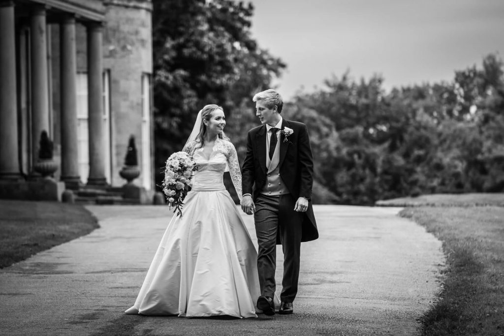 wedding couple walking in the grounds of rudding park