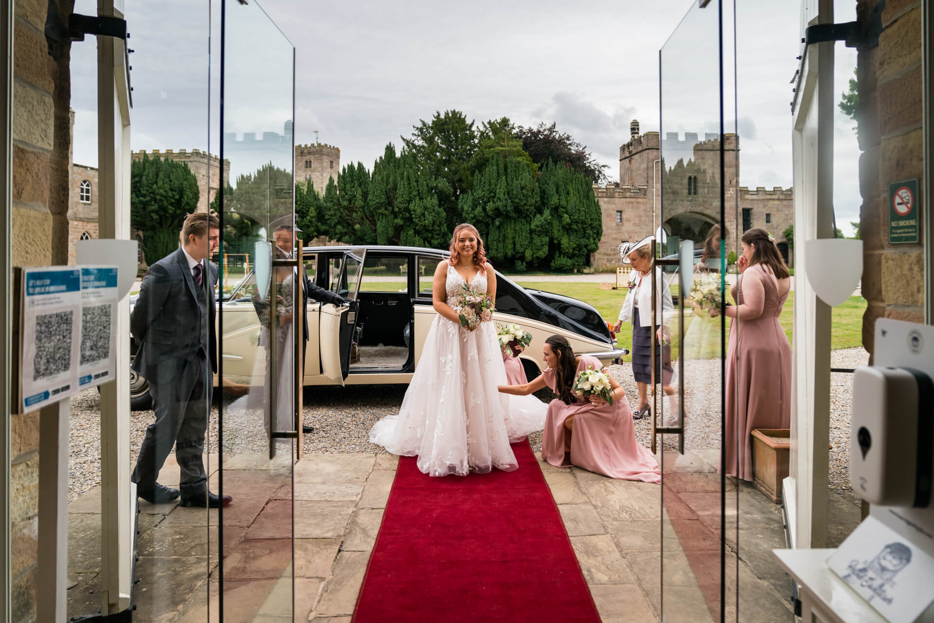 bride arriving at the door of Ripley Castle