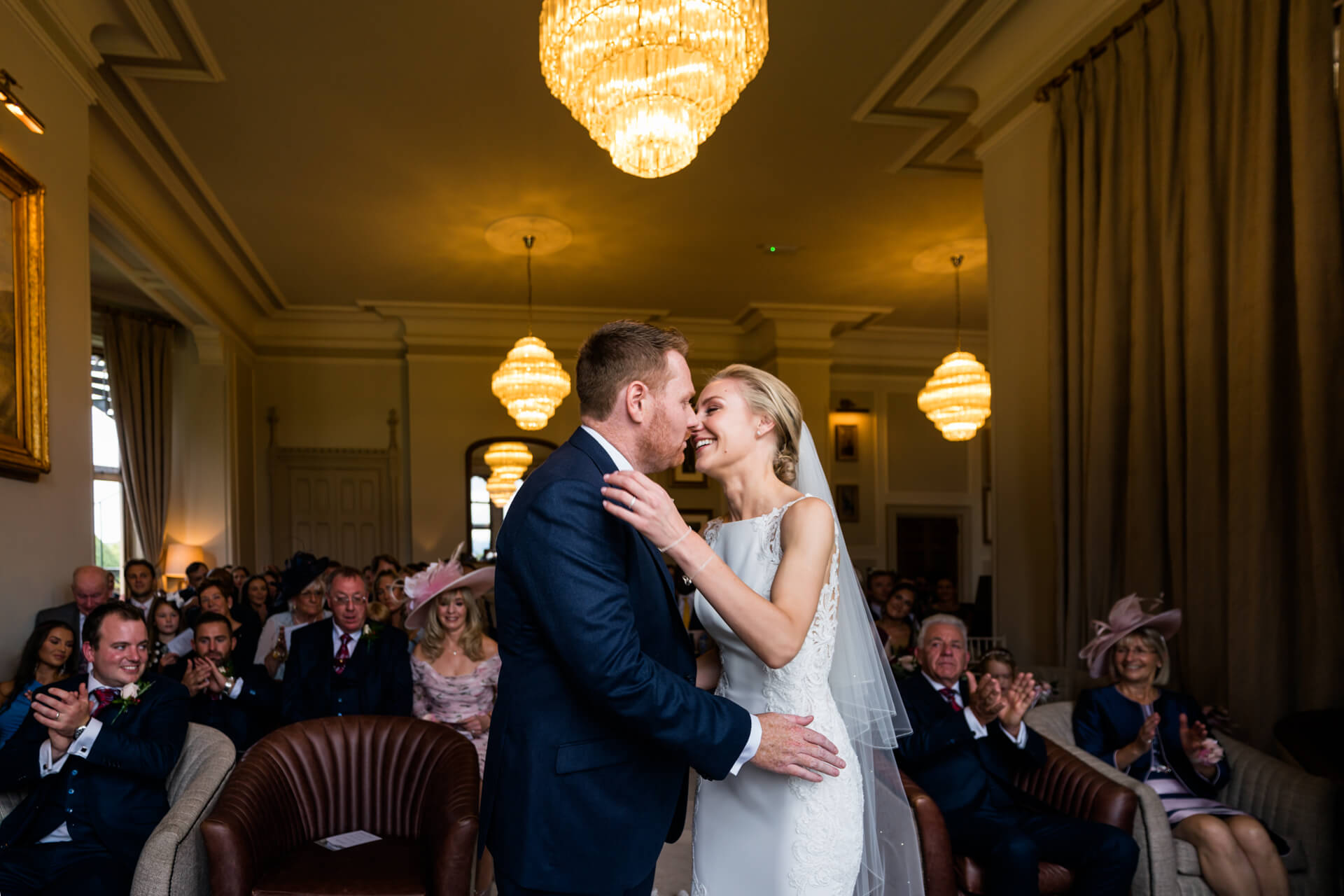 bride and grooms first kiss during the ceremony at Armathwaite Hall