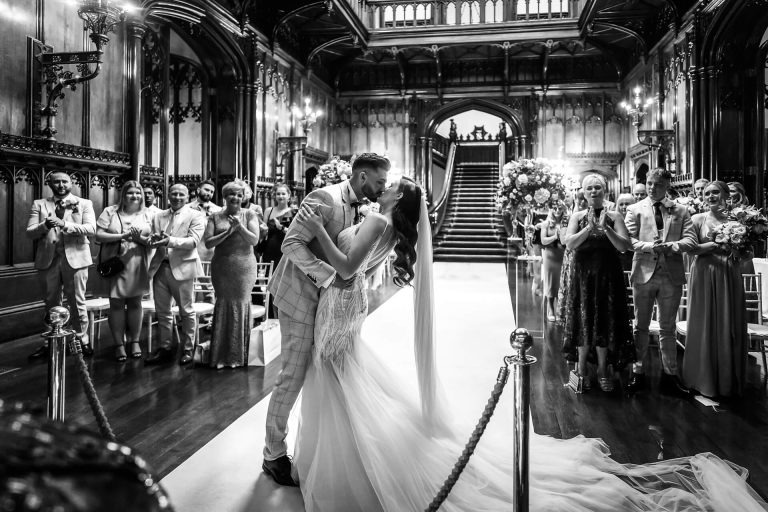wedding couples first kiss after the ceremony at Allerton castle