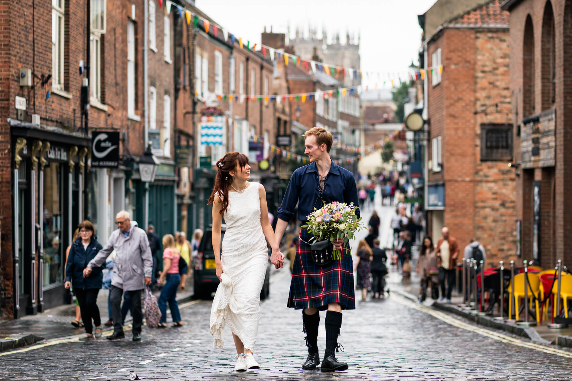 wedding couple walking through the streets of York