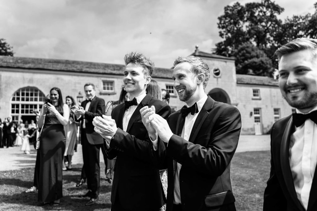 wedding guests clapping