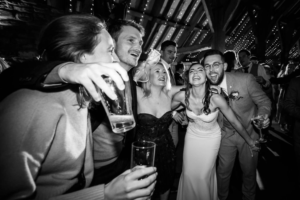 bride on the dance floor with her friends