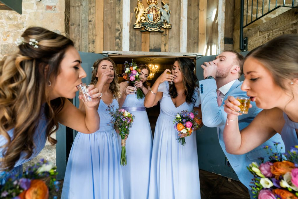 bridal party drinking shots