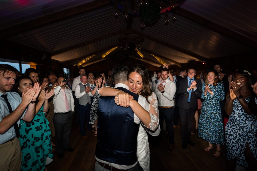 wedding couple's first dance at Woodstock wedding barn