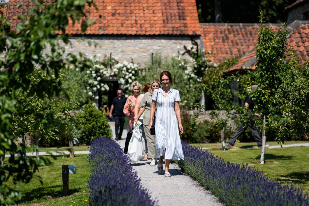 bride and bridesmaids leaving the cottage at Middleton Lodge