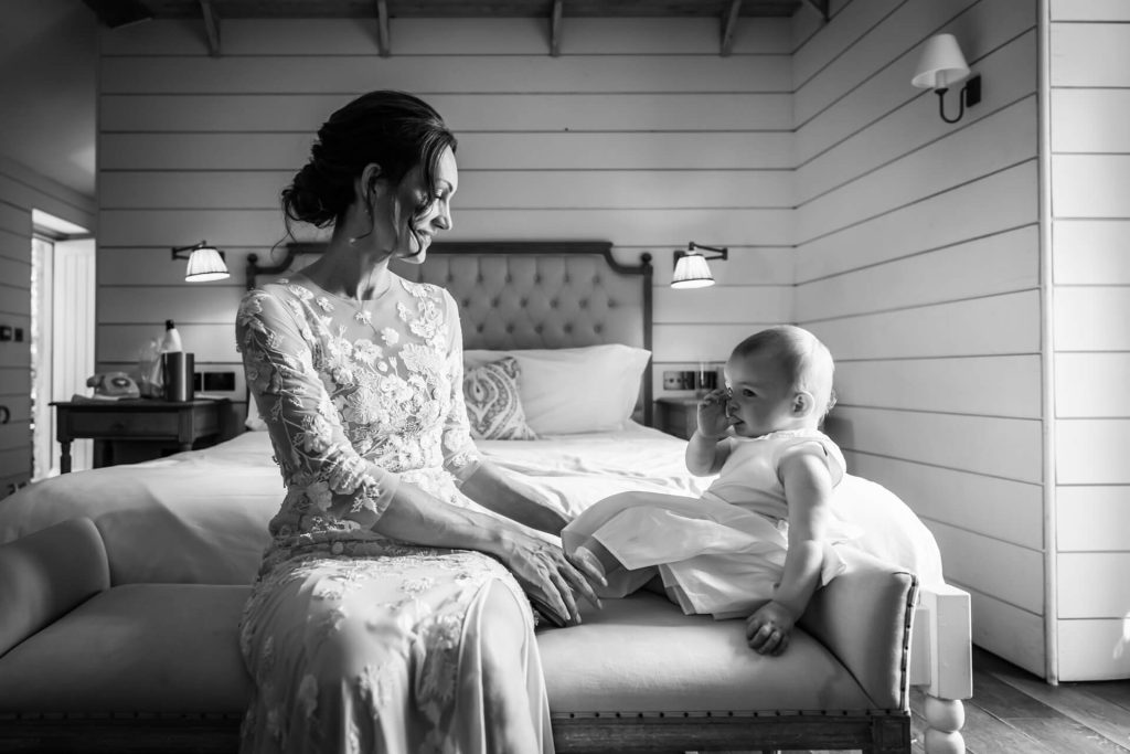 bride sitting with her baby girl