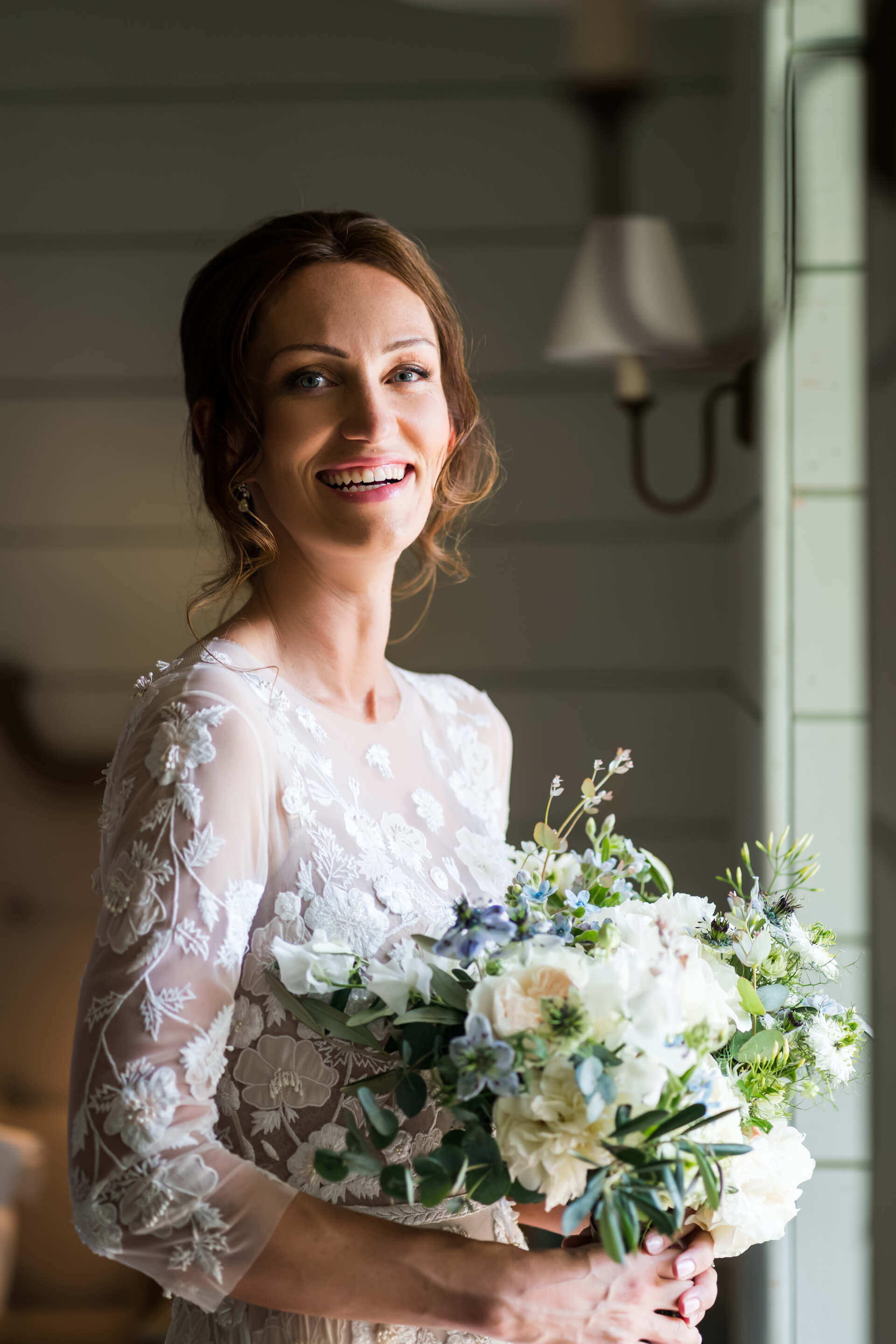 portrait of the. bride in some window light at Middleton Lodge