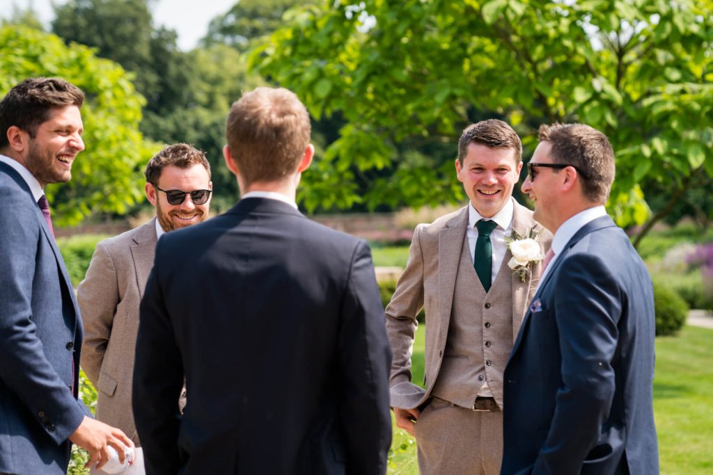 groom talking to guests