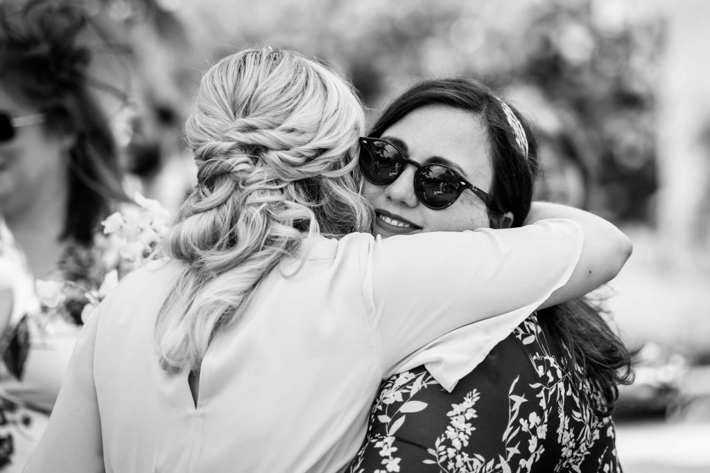 bridesmaid hugging a friend