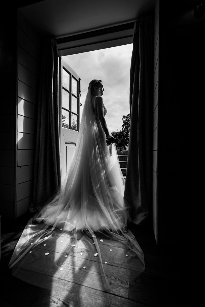 bride standing in the doorway of bridal suite at Middleton Lodge