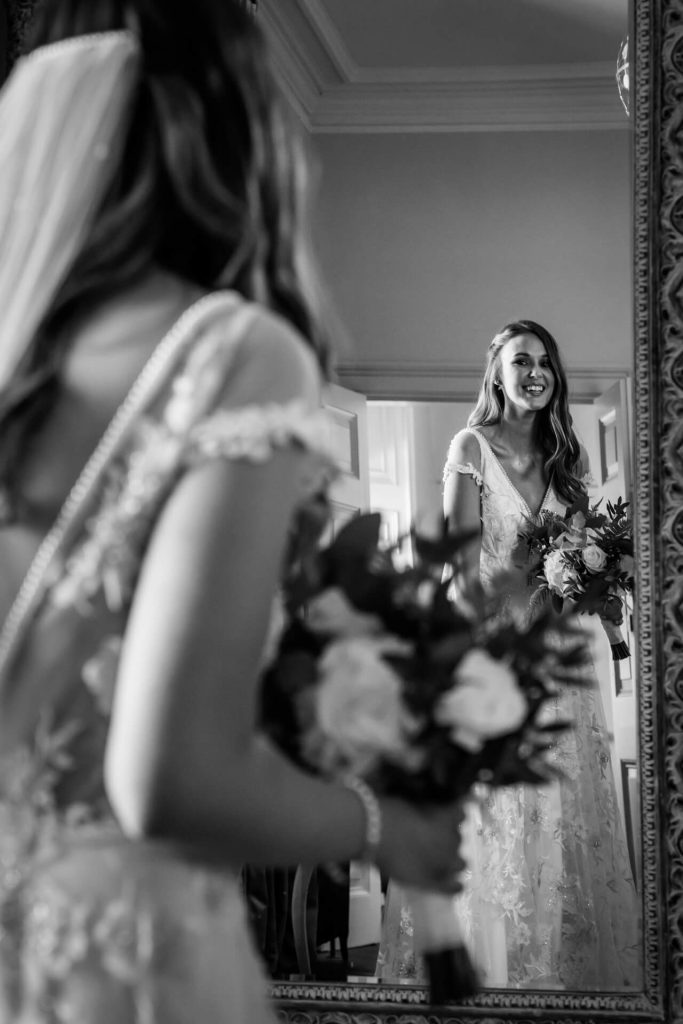 bride looking in a mirror