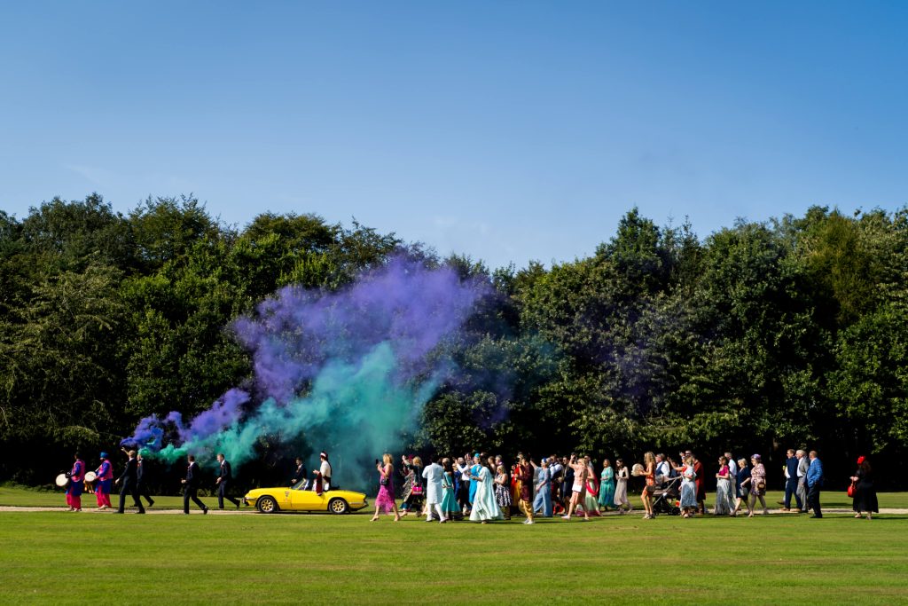 Indian wedding procession through the grounds of Rise Hall