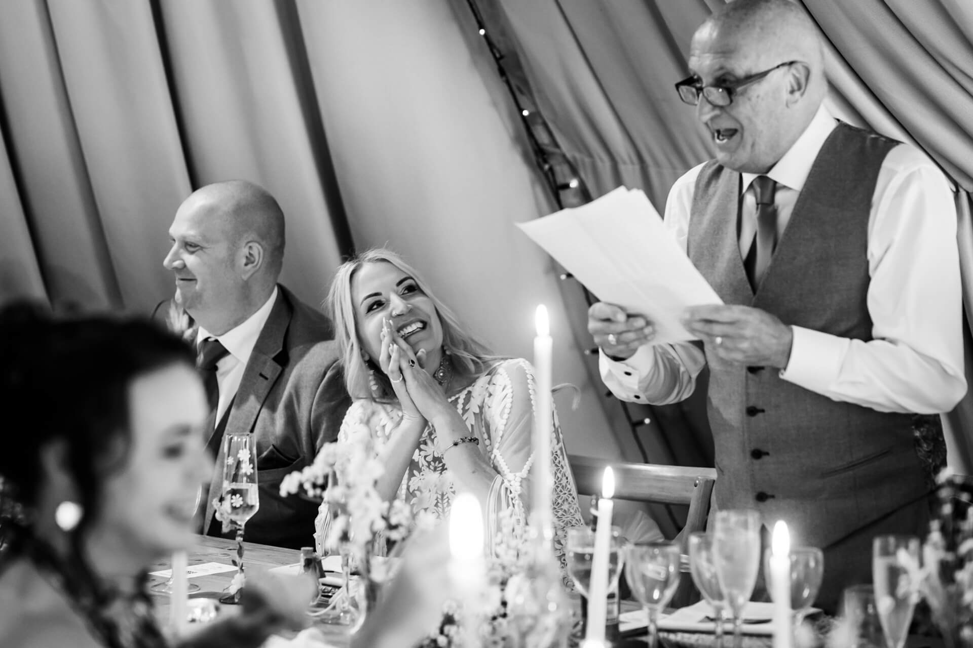 Joyful wedding speech laughter