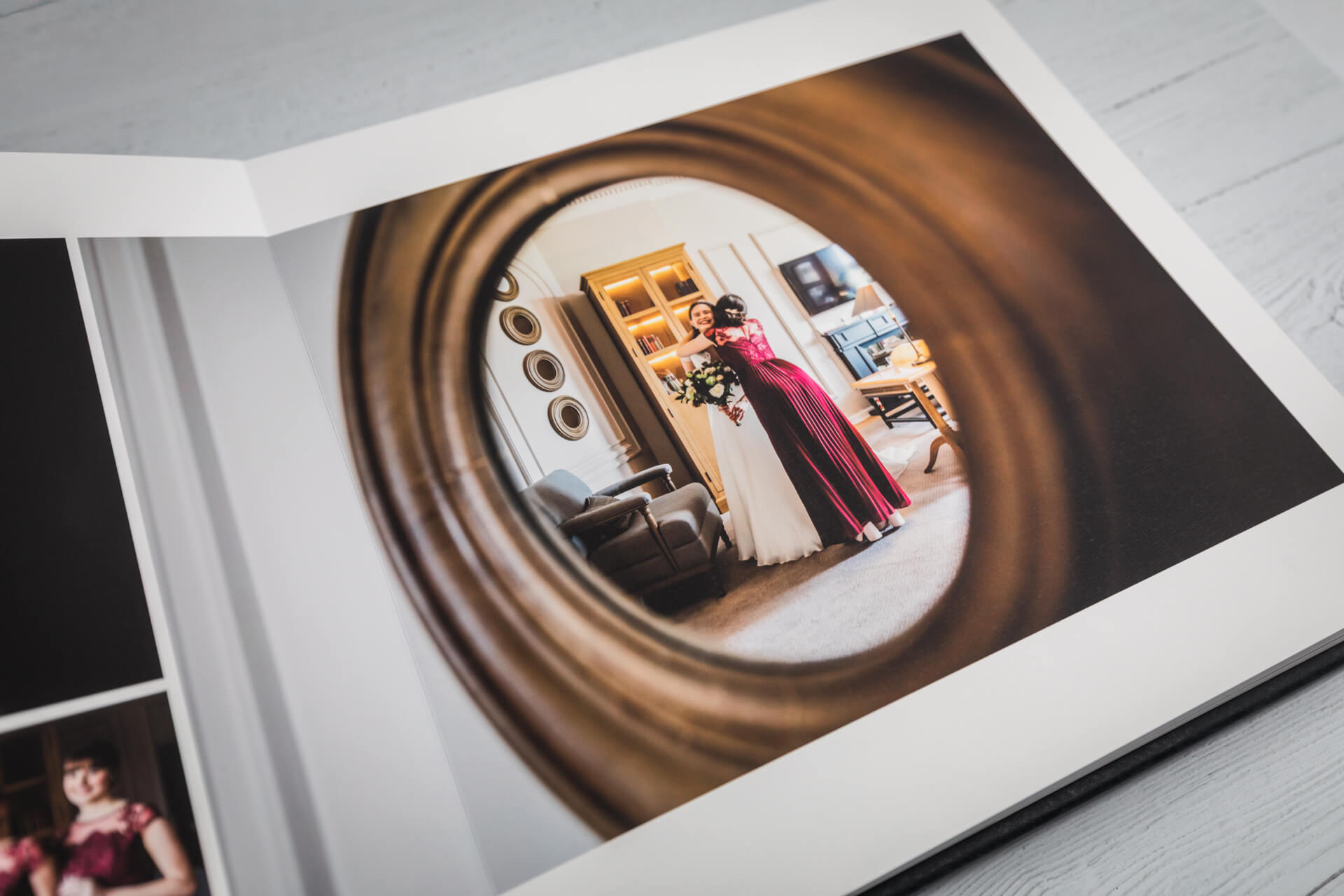 Wedding photo album open on table