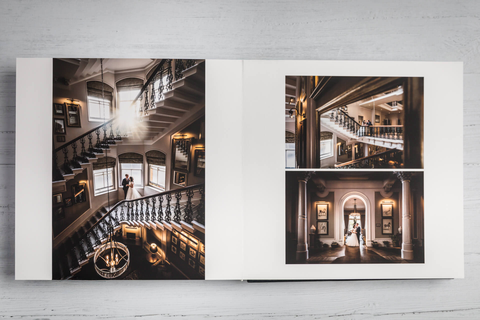 Luxury wedding album with staircase photos.