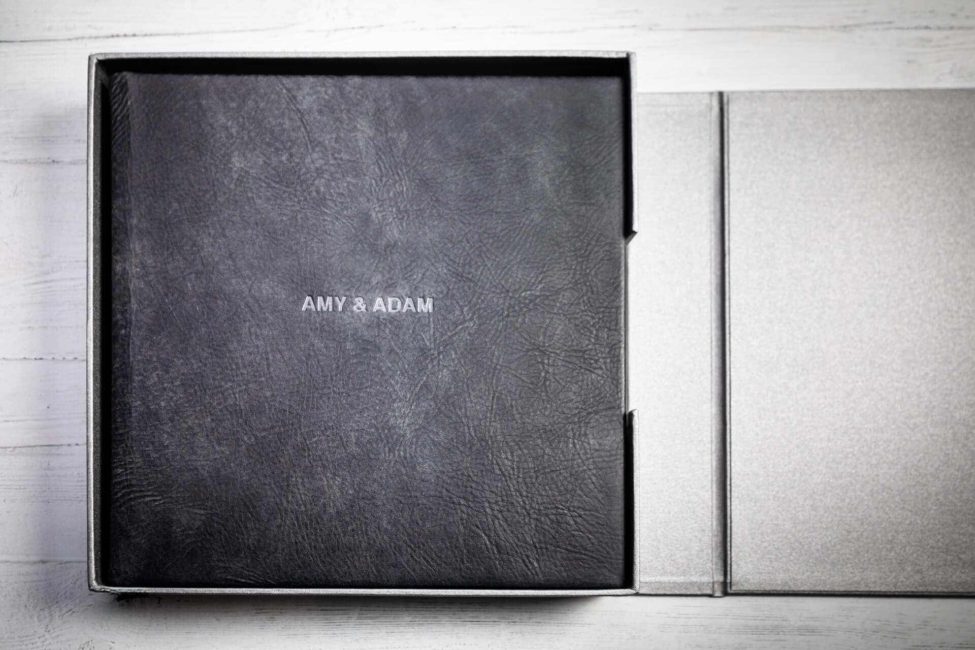 Leather photo album with personalised engraving.