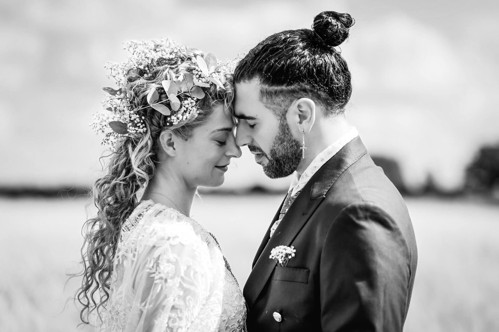 Bride and groom in a romantic embrace.