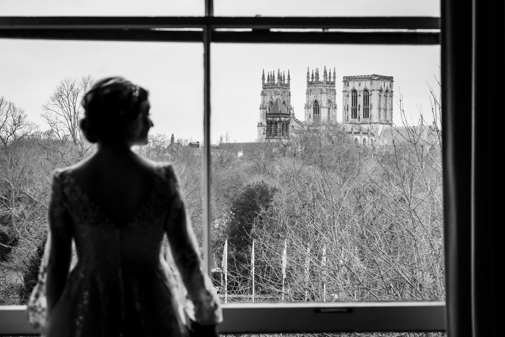 Silhouette of woman overlooking York Minster